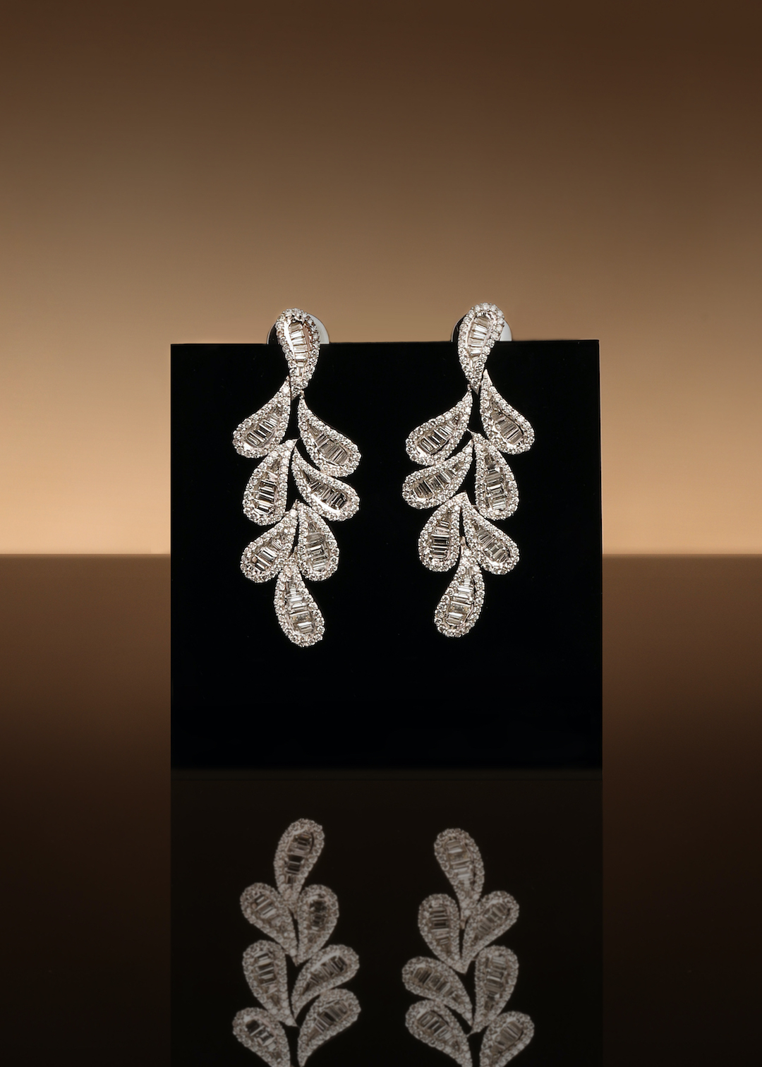 Baguette diamond leaf earrings